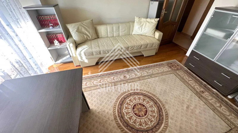 Apartament central cu 2 camere decomandate si parcare