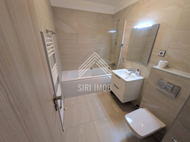 Apartament deosebit cu 2 camere,balcon generos, parcare subterana in Grand Park