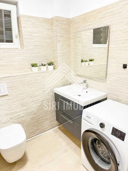  Apartament elegant cu 2 camere,balcon generos si parcare in Grand Park