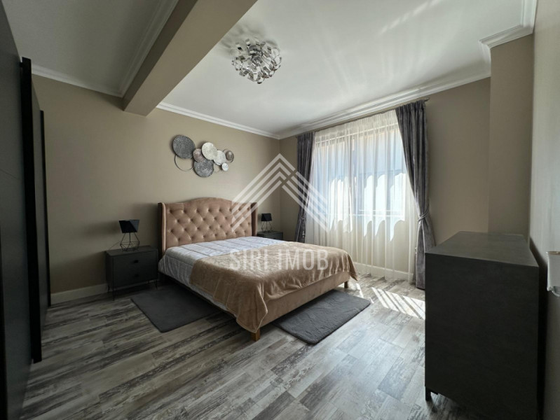 Casa deosebita cu 5 camere, terasa, curte si parcare in Dezmir