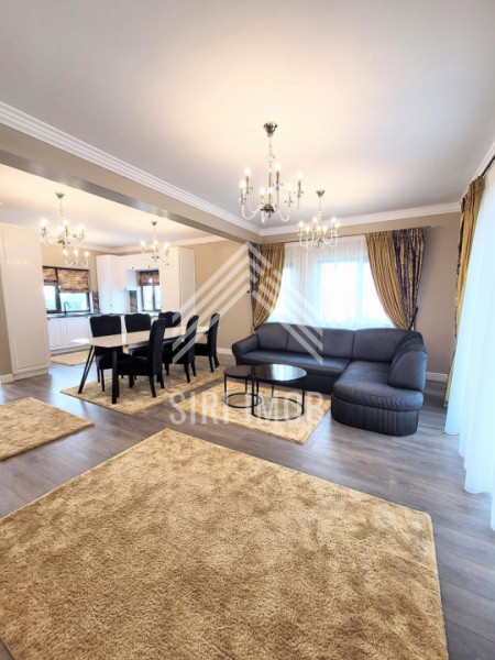 Casa deosebita cu 4 camere, terasa, jacuzzi si parcare in zona Voronet