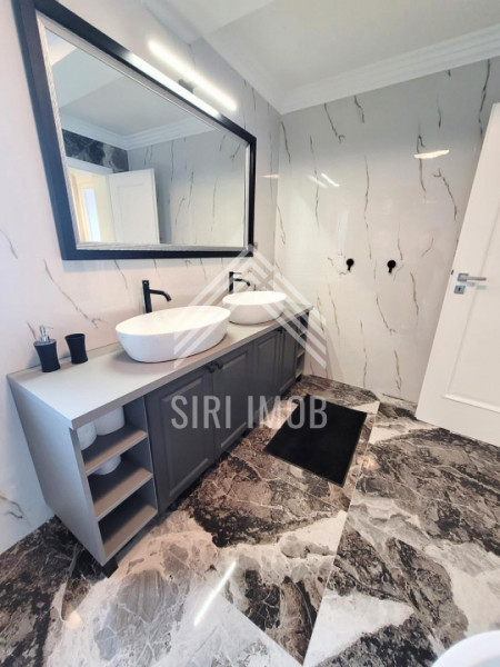 Casa deosebita cu 4 camere, terasa, jacuzzi si parcare in zona Voronet