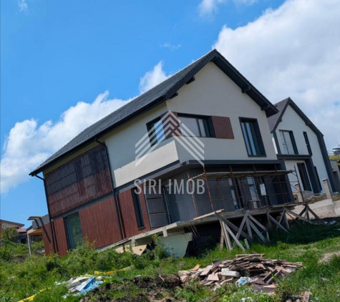 Casă individuală cu vedere panoramică | 136 mp utili + mansardă | 700 mp teren |