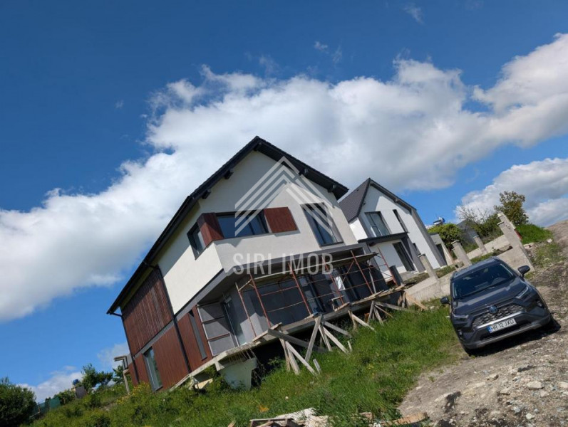 Casă individuală cu vedere panoramică | 136 mp utili + mansardă | 700 mp teren |