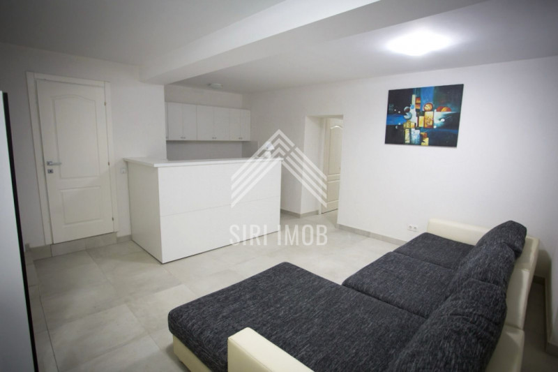 Apartament modern, central cu 2 camere si parcare